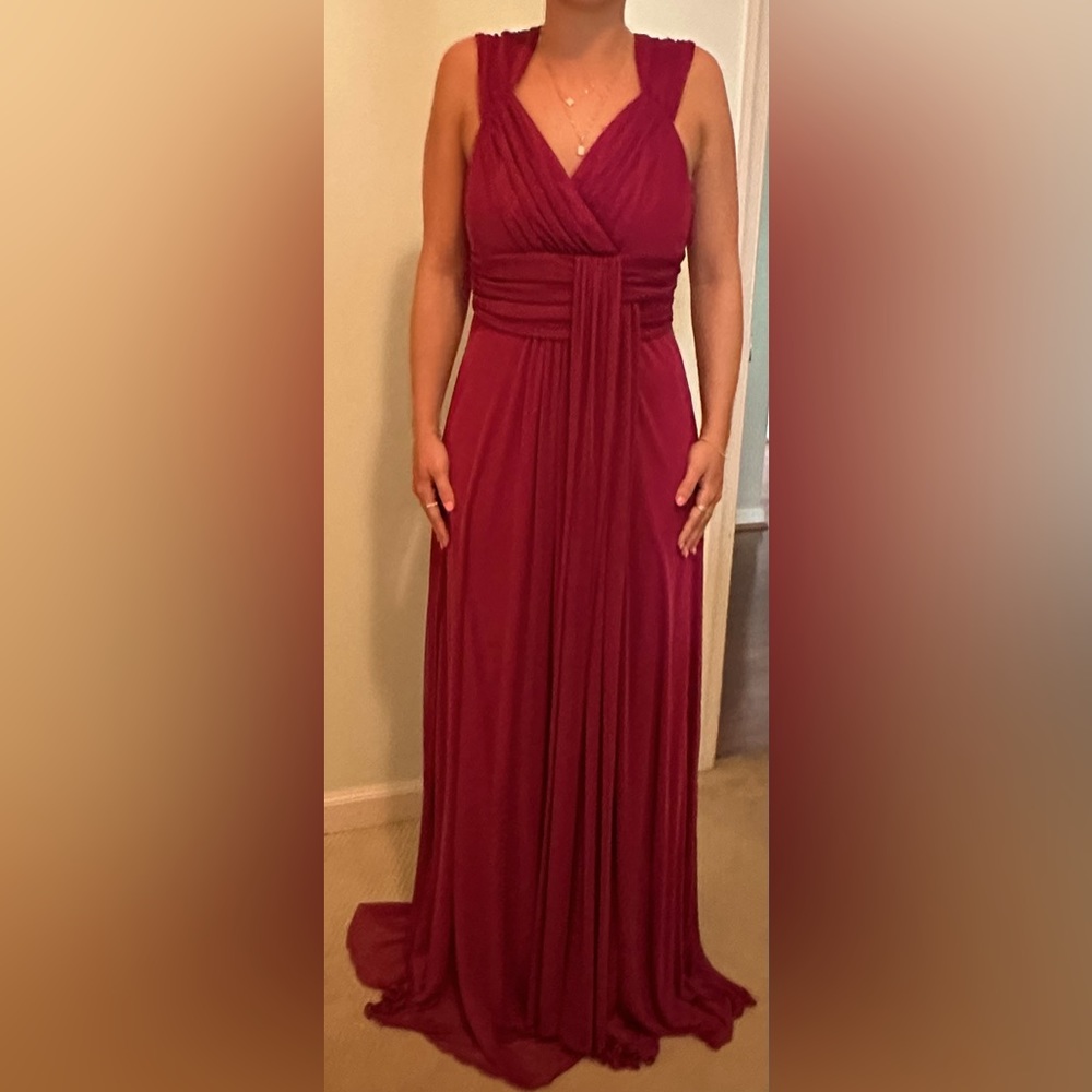 Nwt Beautiful plum (wine) formal dress.  Stunning and elegant.